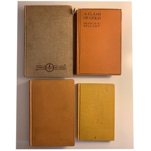 Set of gold tone vintage books